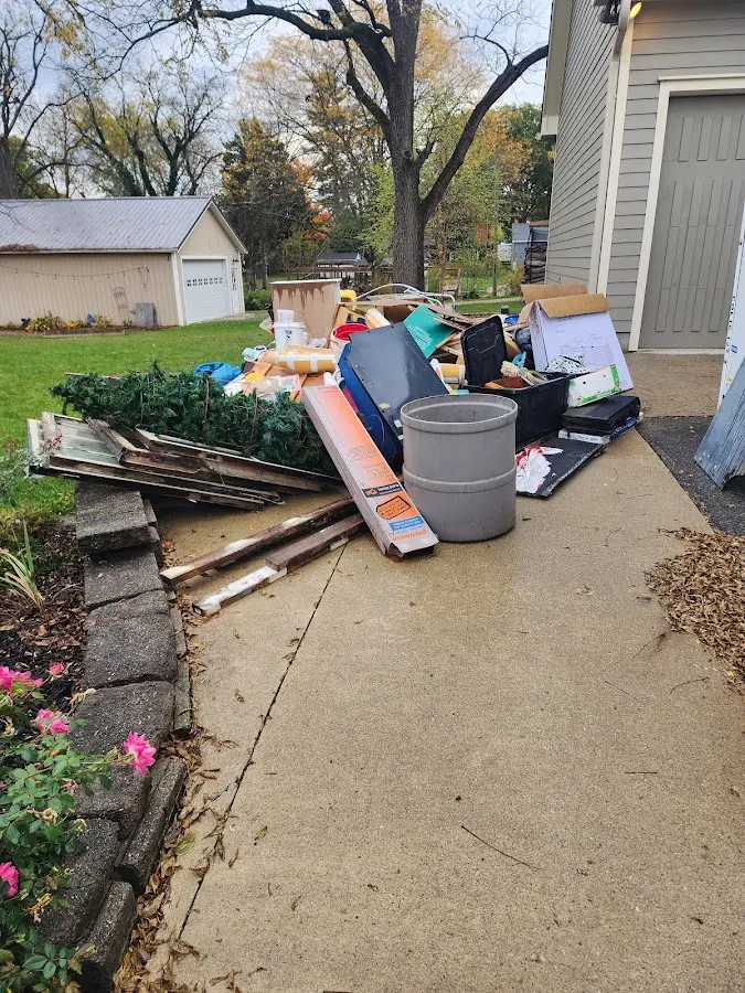 Dumpster being loaded with debris for Commercial Dumpster Rental in Poland